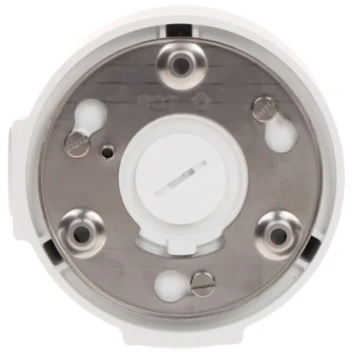 Zdjęcie przedstawia okrągłą, metalową podstawę montażową z kilkoma otworami i śrubami, przeznaczoną do instalacji urządzeń elektronicznych. W centrum znajduje się biały element z rowkiem, prawdopodobnie do regulacji lub mocowania.