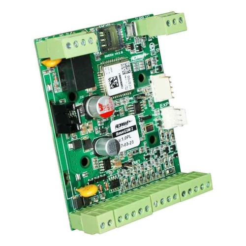 Moduł powiadomienia i sterowania GSM Ropam BasicGSM 2 z widocznymi złączami i elementami elektronicznymi. Urządzenie przeznaczone do zdalnego monitorowania i sterowania systemami alarmowymi.