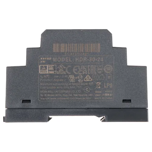 Zdjęcie przedstawia czarny zasilacz montowany na szynie DIN z widocznymi oznaczeniami i certyfikatami na obudowie. Produkt ma prostokątny kształt z wycięciem na górze i jest wykonany z tworzywa sztucznego.