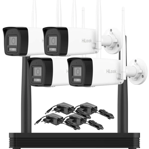 Na zdjęciu znajduje się zestaw do monitoringu Wi-Fi, składający się z czterech białych kamer z czarnymi frontami oraz rejestratora. W dolnej części widoczne są cztery zasilacze z kablami.